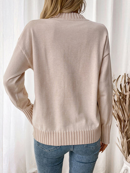 Knitted crew neck sweater with floral details